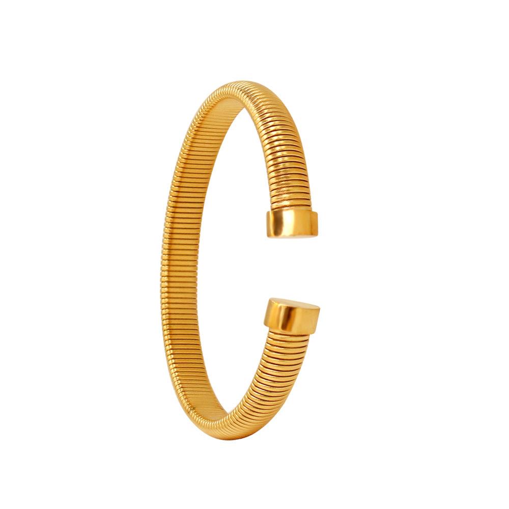 C-Shaped ridged bangle - Gold