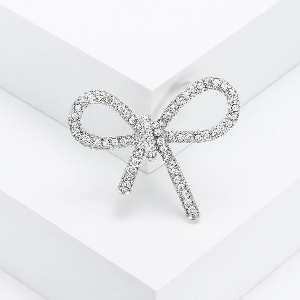 Simple crystal bow brooch