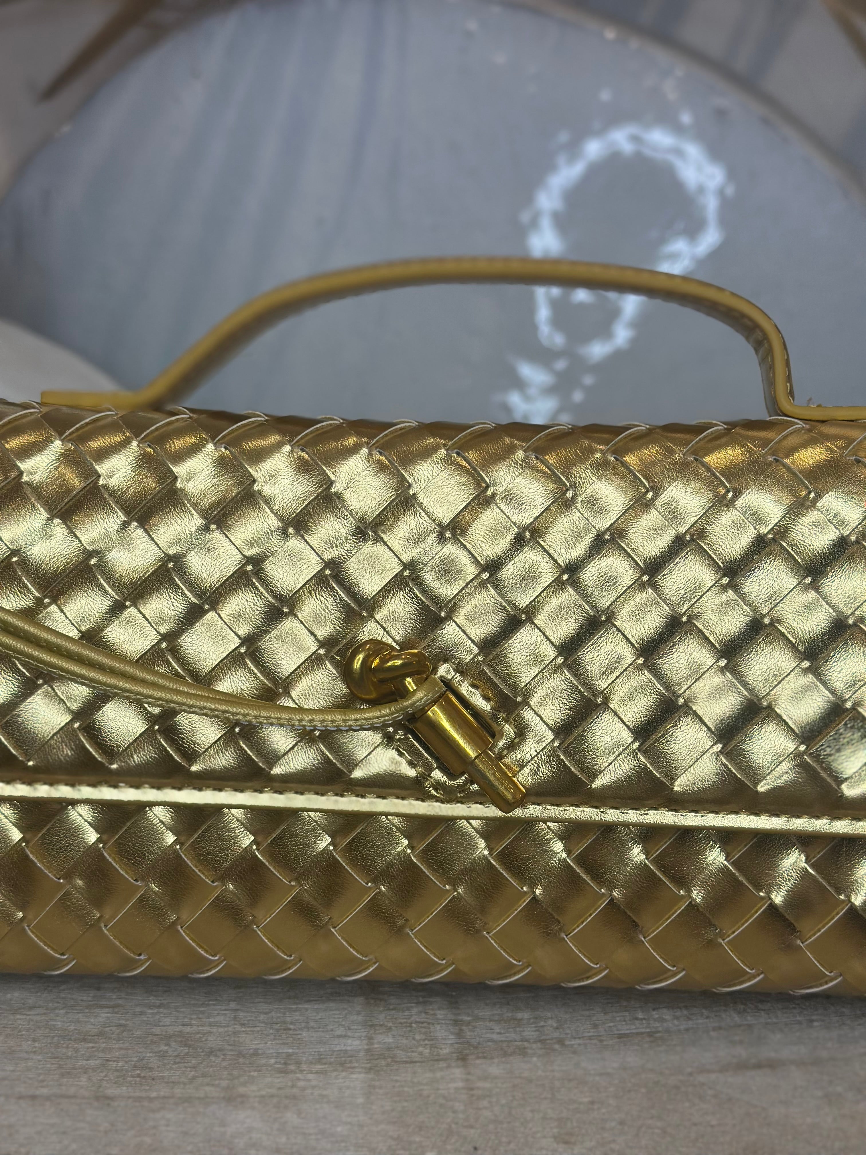 Boti woven envelope knotted clutch