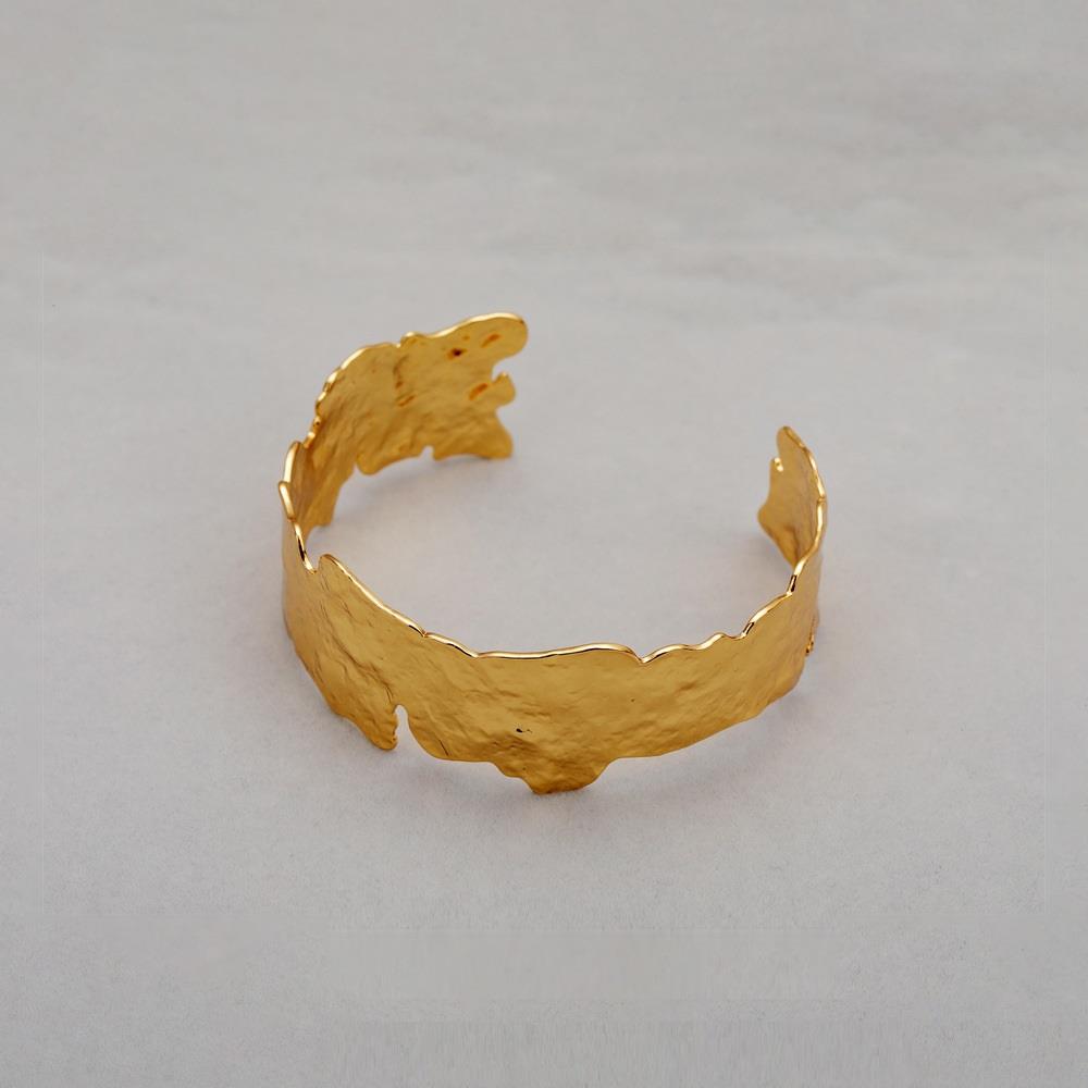 Textured misshape bangle in gold