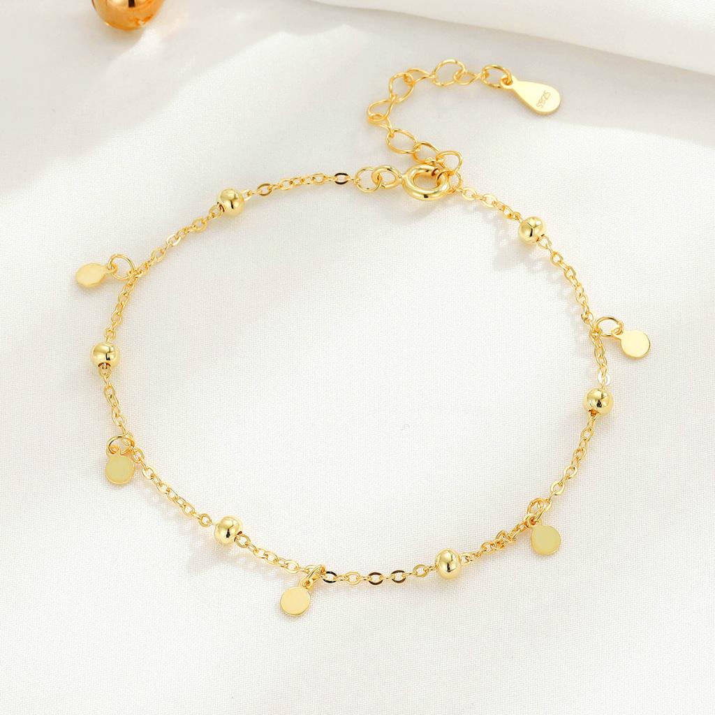 Gold ball & disc bracelet