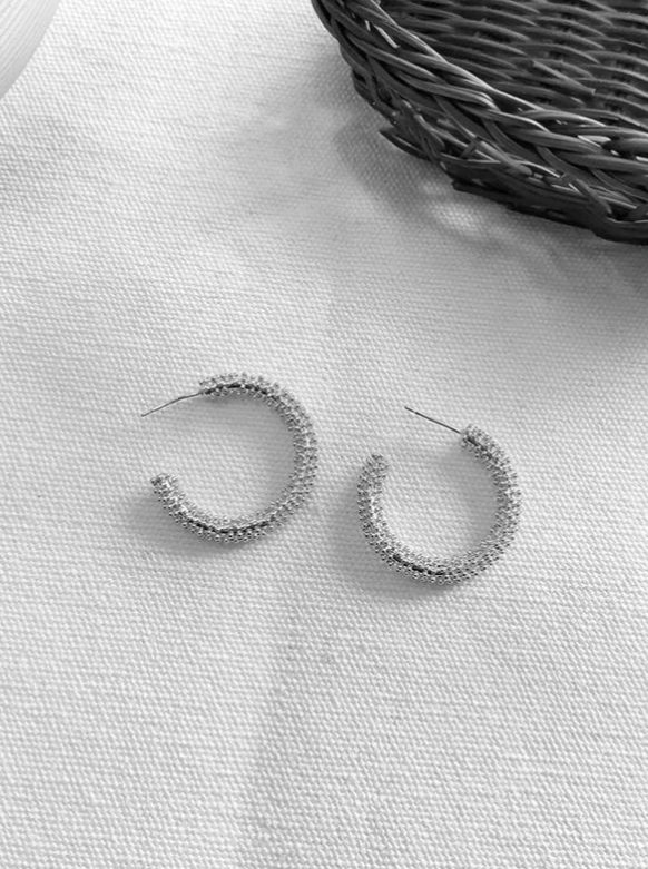 Textured hoop earring in silver