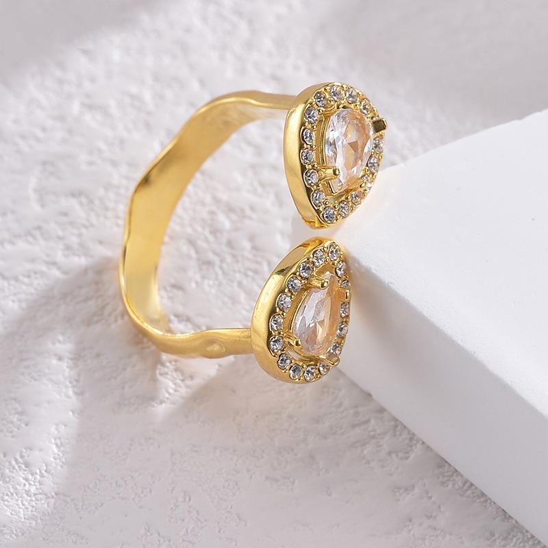 Double teardrop gem open ended ring